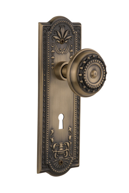 Nostalgic 701810: Meadows Backplate w/Meadows Knob Privacy Door Set - Antique Brass