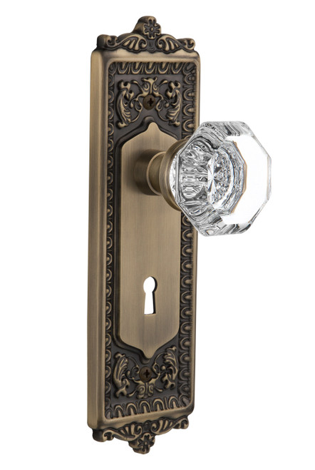 Nostalgic 704258: Egg & Dart Backplate w/Waldorf Knob Passage Door Set - Antique Brass