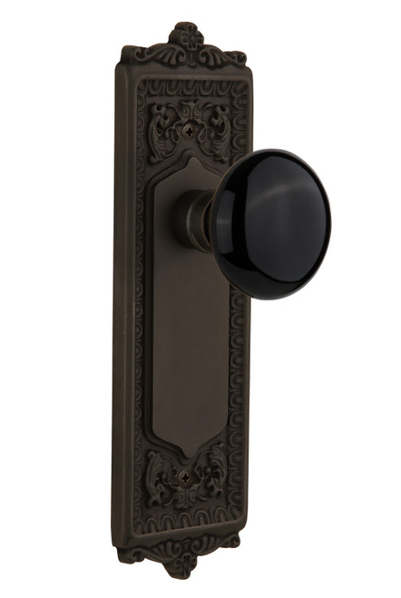 Nostalgic 710010: Egg & Dart Backplate w/Black Porcelain Knob Passage Door Set - Oil-Rubbed Bronze