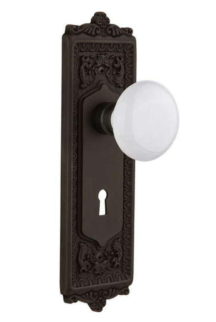Nostalgic 704281: Egg & Dart Backplate w/White Porcelain Knob Privacy Door Set - Oil-Rubbed Bronze