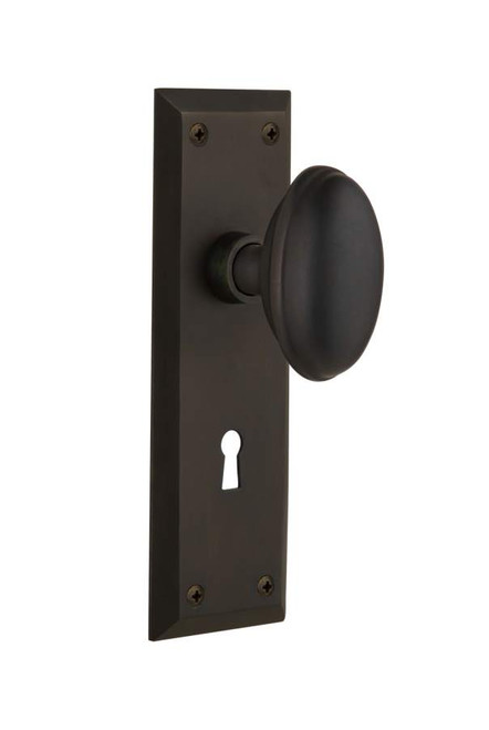 Nostalgic 704586: New York Backplate w/Homestead Knob Passage Door Set - Oil-Rubbed Bronze