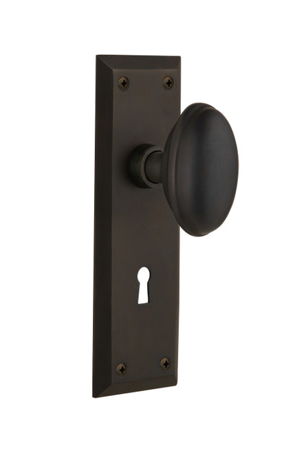 Nostalgic 704586: New York Backplate w/Homestead Knob Passage Door Set - Oil-Rubbed Bronze