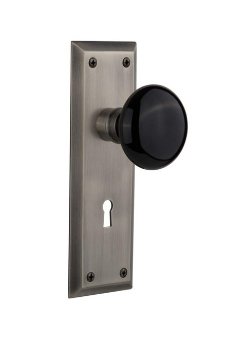 Nostalgic 710364: New York Backplate w/Black Porcelain Knob Privacy Door Set - Antique Pewter