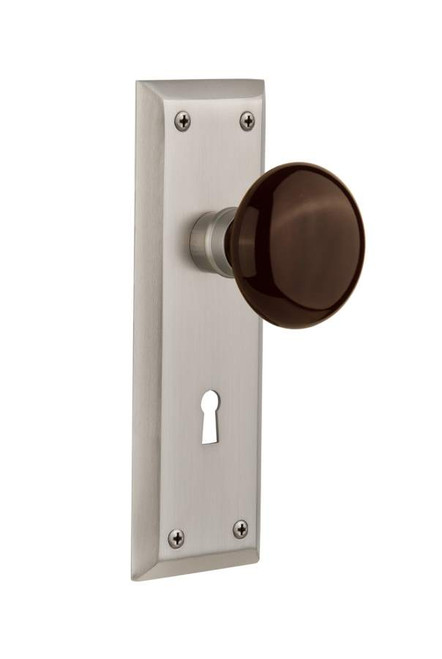 Nostalgic 710520: New York Backplate w/Brown Porcelain Knob Passage Door Set - Satin Nickel