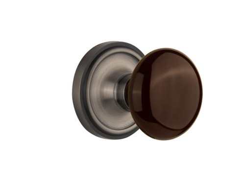 Nostalgic 710441: Classic Rosette w/Brown Porcelain Knob Passage Door Set - Antique Pewter