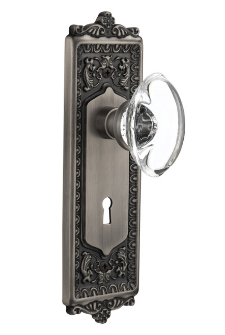 Nostalgic 711382: Egg & Dart Backplate w/Oval Clear Glass Crystal Knob Passage Door Set - Antique Pewter