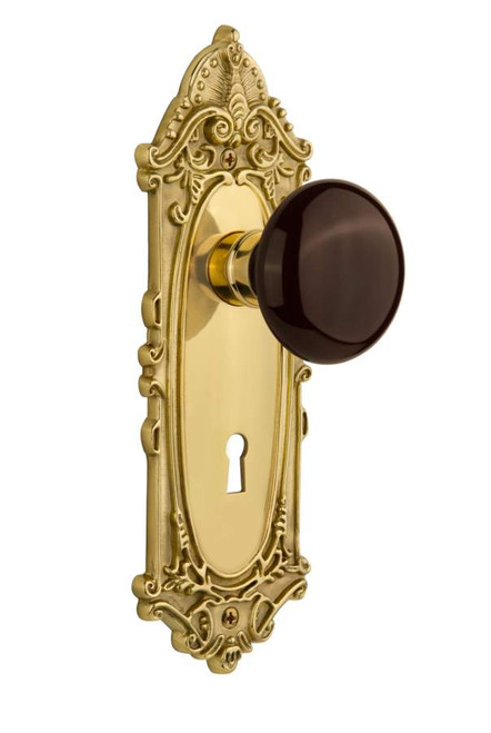 Nostalgic 710533: Victorian Backplate w/Brown Porcelain Knob Passage Door Set - Polished Brass