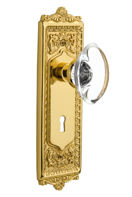 Nostalgic 711385: Egg & Dart Backplate w/Oval Clear Glass Crystal Knob Passage Door Set - Polished Brass