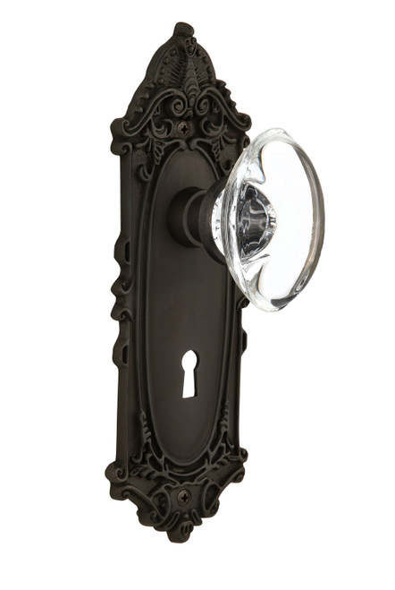 Nostalgic 711700: Victorian Backplate w/Oval Clear Glass Crystal Knob Privacy Door Set - Oil-Rubbed Bronze