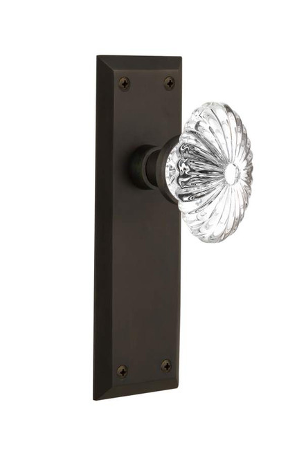 Nostalgic 712072: New York Backplate w/Oval Fluted Clear Glass Crystal Knob Privacy Door Set - Oil-Rubbed Bronze