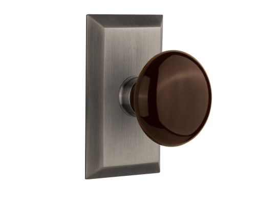 Nostalgic 713387: Studio Backplate w/Brown Porcelain Knob Privacy Door Set - Antique Pewter