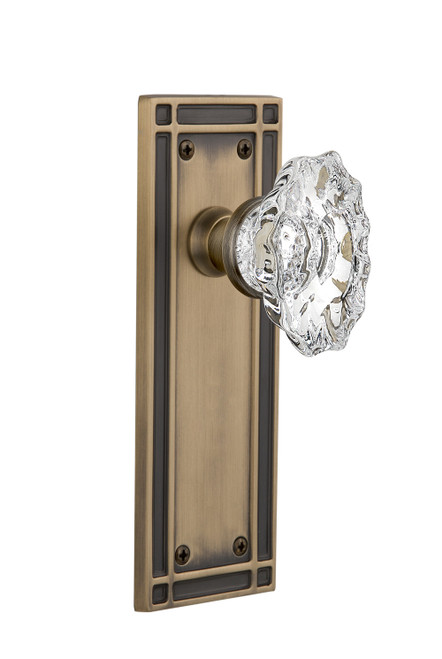 Nostalgic 713666: Mission Backplate w/Chateau Knob Passage Door Set - Antique Brass