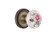 Nostalgic 710908: Rope Rosette w/White Rose Porcelain Knob Passage Door Set - Antique Brass
