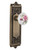 Nostalgic 710887: Egg & Dart Backplate w/White Rose Porcelain Knob Passage Door Set - Antique Brass