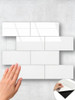 Modern interior with large white subway composite tiles by Layed WSTL63 peel and stick wall application
