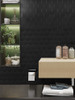Bathroom vanity wall decorated with Layed MBHT57 Matte Black Hexagon tiles for a sophisticated, textured look.