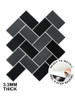 DIY home renovation showing easy installation of Onyx Black Herringbone wall tiles.