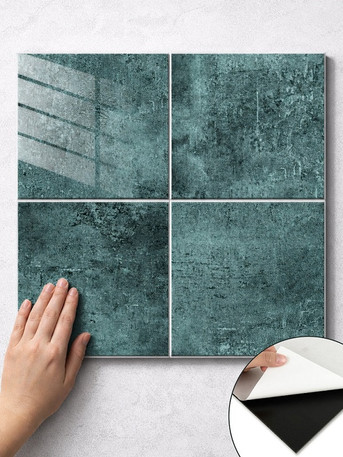 Emerald green peel and stick composite wall tiles square 300x300mm with hand showing scale