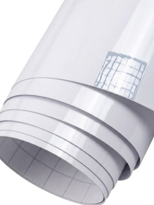A partially unrolled roll of Layed Gloss White Vinyl Wrap G601, showcasing its highly reflective, mirror-like white gloss finish and the grid-lined self-adhesive backing paper.