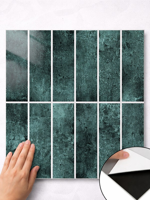 Close up of emerald green textured peel and stick composite wall tile surface