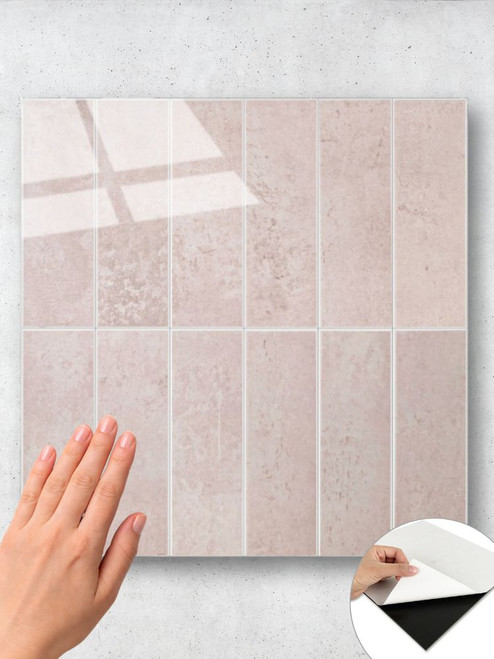 Close-up of rose pink rectangular self adhesive composite tiles showing texture and finish