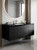 Modern bathroom vanity unit wrapped in layed Black Stucco Plaster Vinyl Wrap BSP88.