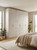 Modern neutral bedroom featuring large built-in wardrobes upcycled with Beige Weathered Cement Vinyl Wrap BWC32