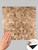 Graphic showing the sample size proportion against a full sheet of Layed brass mosaic peel and stick composite wall tile.