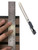 Utility knife scoring a wood slat wall panel along a heavy-duty stainless steel ruler edge on a grid cutting mat.