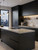 A sleek, non-reflective kitchen finish achieved using a beginner-friendly eco matte vinyl wrapping kit.