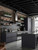 Modern industrial kitchen featuring cabinets and an island upcycled with Matte Textured Anthracite Grey Vinyl Wrap MTAG15.