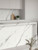 A striking kitchen island and matching backsplash completely transformed using Layed Calacatta White Marble Vinyl Wrap, creating a high-end, seamless look.