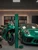 Sports car fully wrapped in Super Gloss Metallic Isle of Man Green vinyl wrap SGM-IOM68