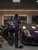 Sports car and motorcycle wrapped in Super Gloss Metallic Midnight Purple vinyl wrap SGM-MP71 next to standing vinyl roll