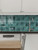 Peel and stick composite wall tile showing strong adhesive backing layer