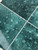 Close up of Emerald green peel and stick composite wall tile