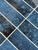 Close-up of marine blue composite rectangle tiles showing texture and gloss finish