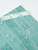Waterproof Sage Green composite tile backsplash wiping clean from kitchen splatters