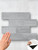 Layed SCST80 silver concrete subway peel and stick tiles creating a modern feature wall