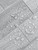 Waterproof silver concrete composite subway tiles installed in a stylish bathroom setting