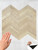 Durable Layed Sonoma Oak SOCT73 composite wall tiles in a classic chevron pattern for home decor.