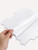 An image showing the back of an FSWMT51 panel with the adhesive backing exposed, illustrating the easy peel-and-stick installation.