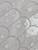 High-resolution close-up of the FSWMT51 fan tile, highlighting the realistic white marble texture and natural veining pattern.