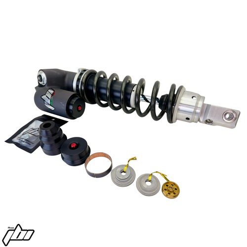 Ducati Desmo450 MX Pro Shock DIY Kit Components next to JBI Spec Showa Mono Shock