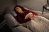 Woman sleeping in recliner designed for sleep comfort