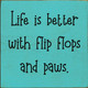 Life is better with flip flops and paws.