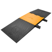 Black Titan 5-Channel ADA Polyurethane Cable Protector with Orange Lid Closed