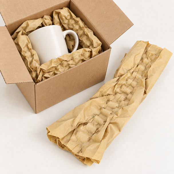 Solex PaperCloud paper cushioning pads used around a ceramic mug in a shipping carton