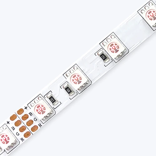 High-resolution, diagonal close-up shot of the ColorBright™ RGB 300 IP20 LED Strip showing precise solder points.