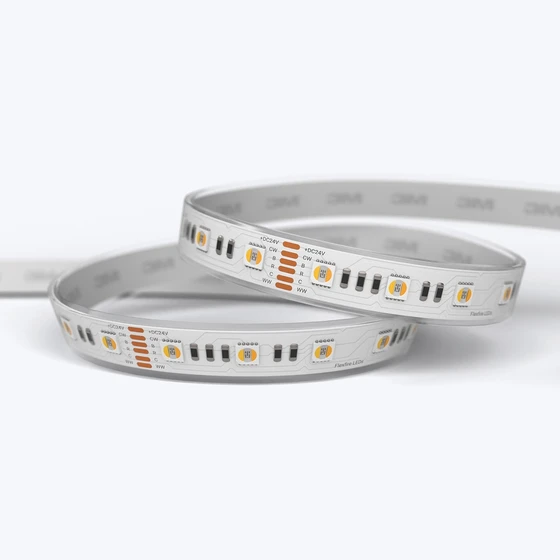 A coiled Outdoor ColorBright™ RGB + Tunable White IP65 LED Strip with a silicon-coated circuit board and 3M adhesive backing.